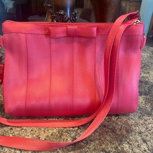 Harveys seatbelt Grapefruit bow crossbody